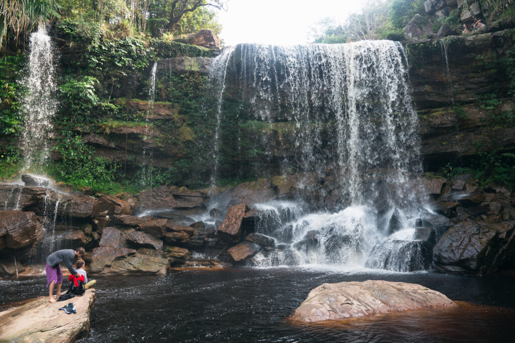 Popokvil Waterfall surrounded by lush greenery, Cambodia