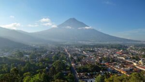 The view of the volcano and town from Cerro De La Cruz viewpoint in Antigua, Guatemala.