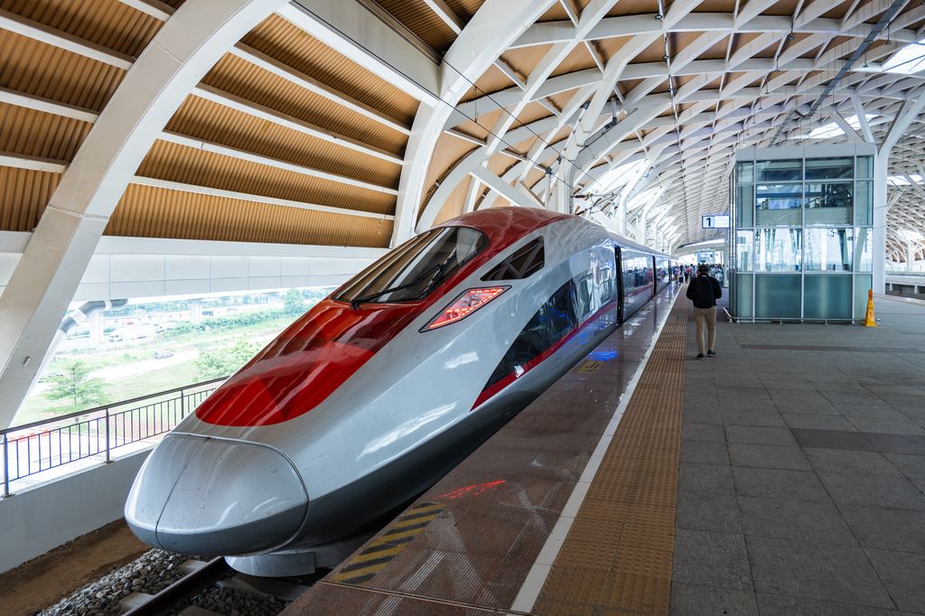 A high-speed train at a train station in Java, Indonesia.