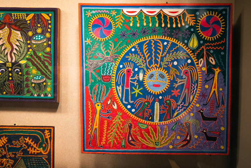 vibrant Huichol yarn paintings, in the Anthropological Museum in Mexico City