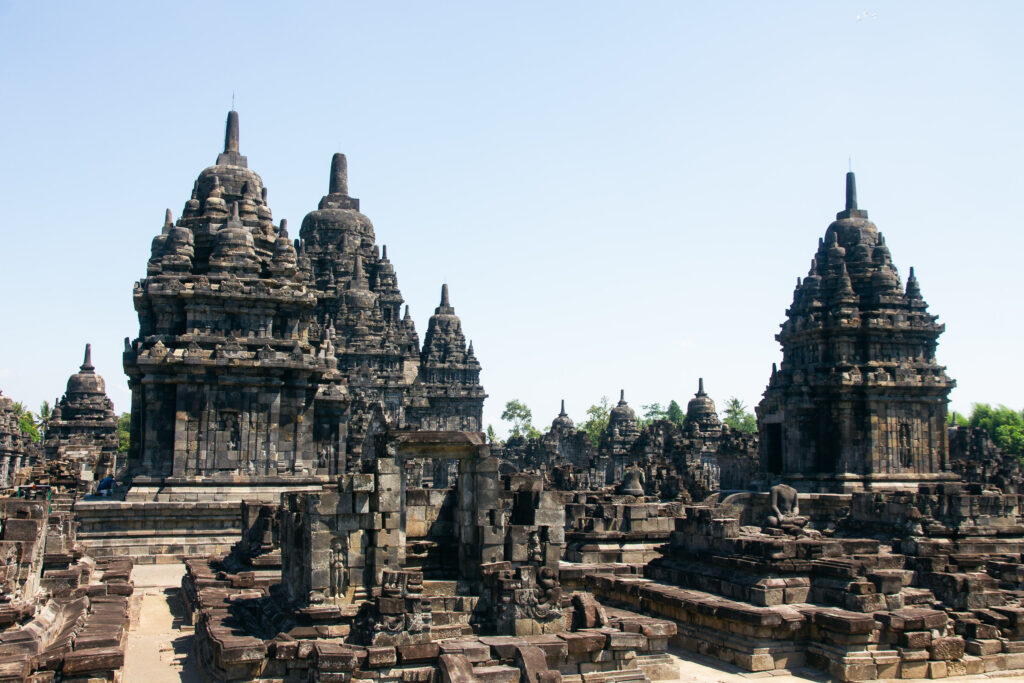 Prambanan Temple complex with towering spires and scattered ruins