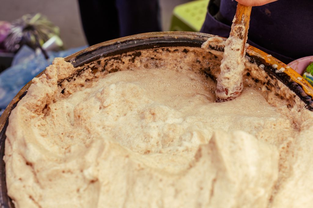 Tejate being prepared in a cauldron