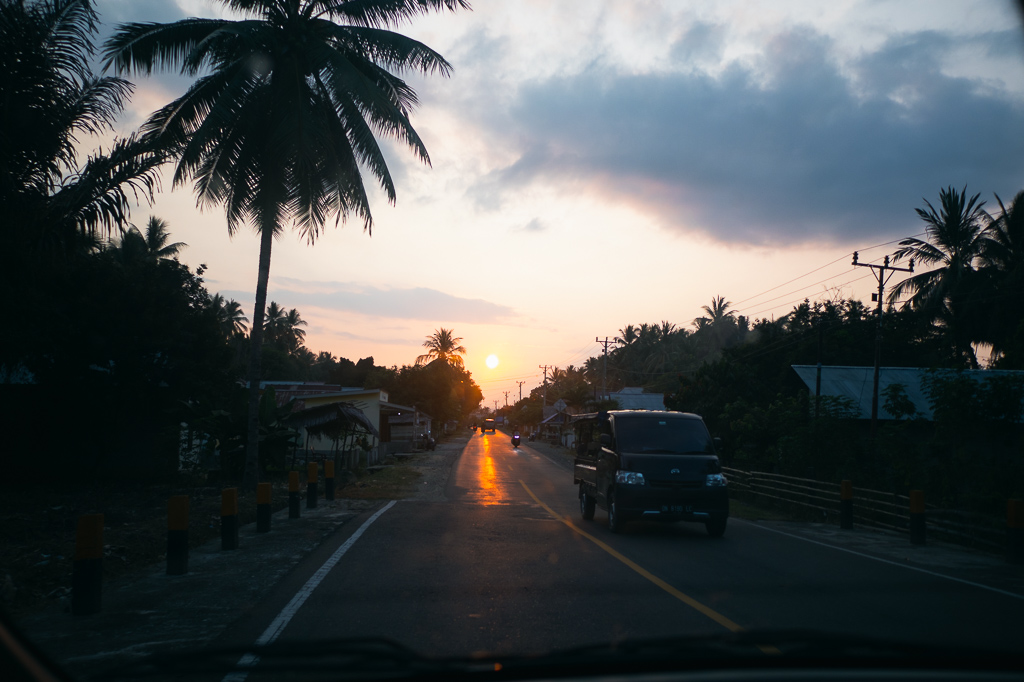 Sunset over a quiet village road in Tentana, Sulawesi
